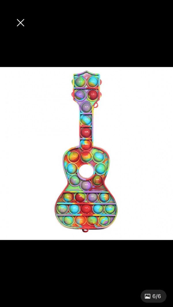 Popitgitarr färgexploderad